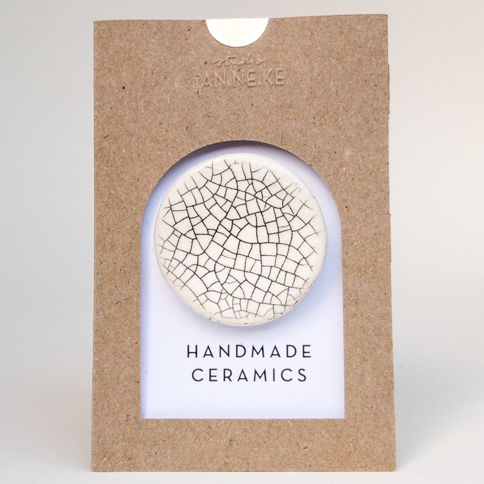 Crackle circle brooch by Janneke