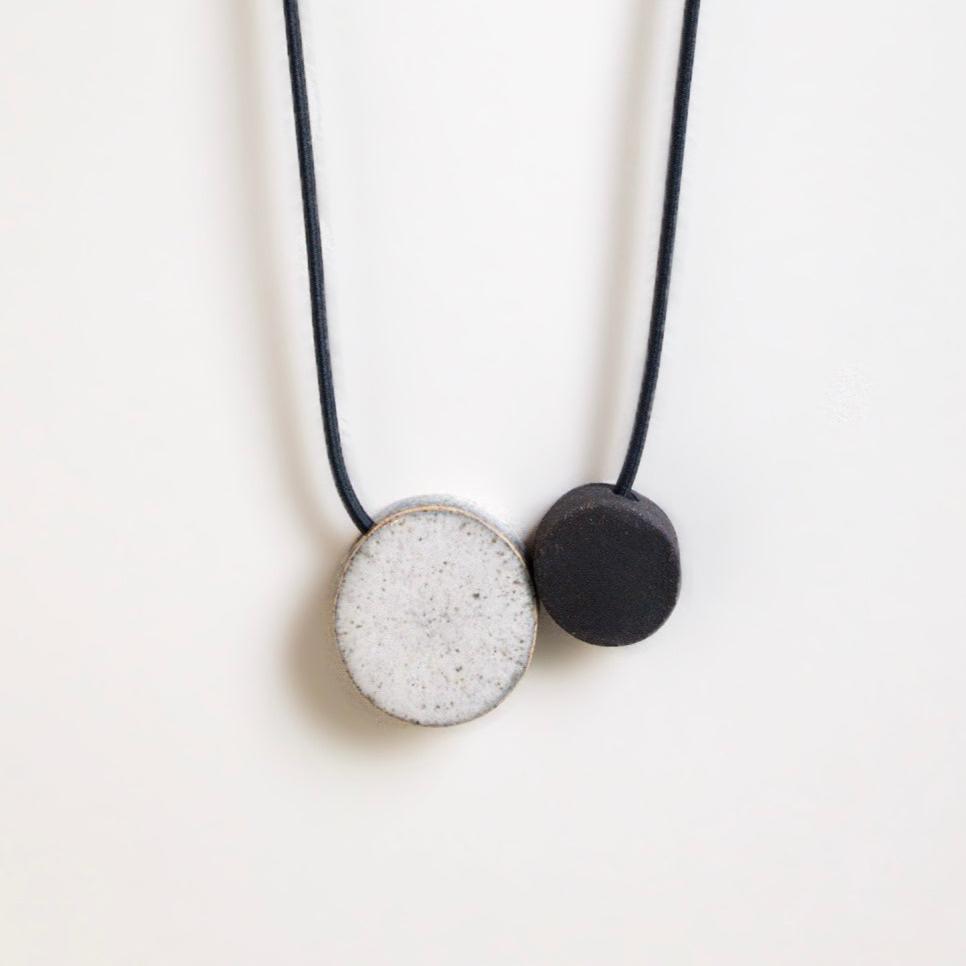 Geo dot gloss and unglossed bead necklace by Janneke