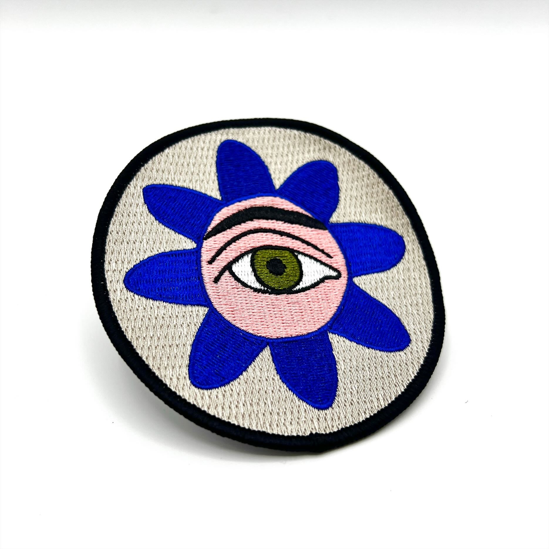 Unravel Feliciano Centurion Eye with ñandutí Embroidered Patch